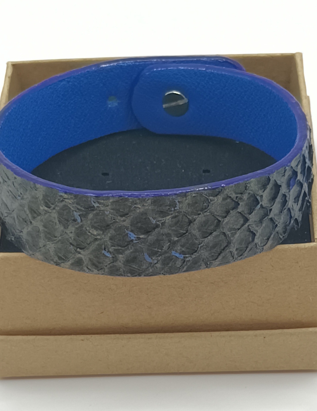 Bracelet bleu aux reflets bronze en saumon