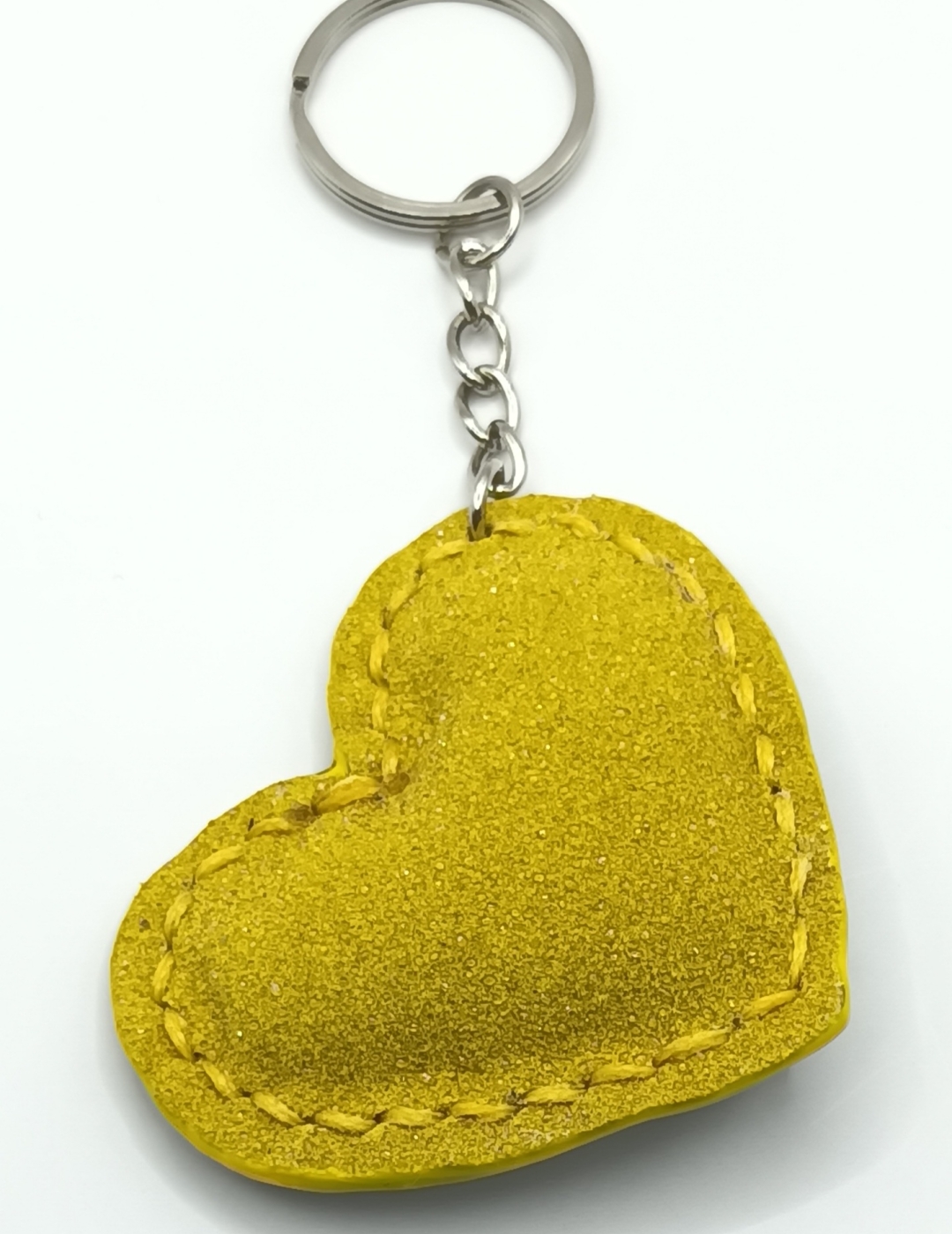 Porte-clés cœur jaune perlé et vert avec des reflets