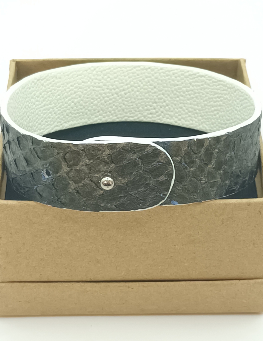 Bracelet bleu aux reflets bronze et blanc en saumon