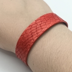 Bracelet rouge mat en saumon et noir