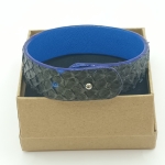 Bracelet bleu aux reflets bronze en saumon